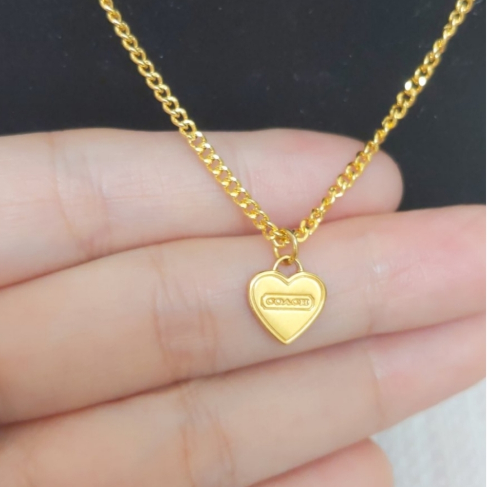 Coach heart charm gold plated Necklace